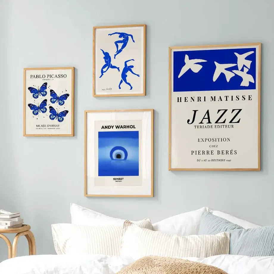 Set of four blue and white framed art prints including butterfly botanical canvas for stylish living room decor