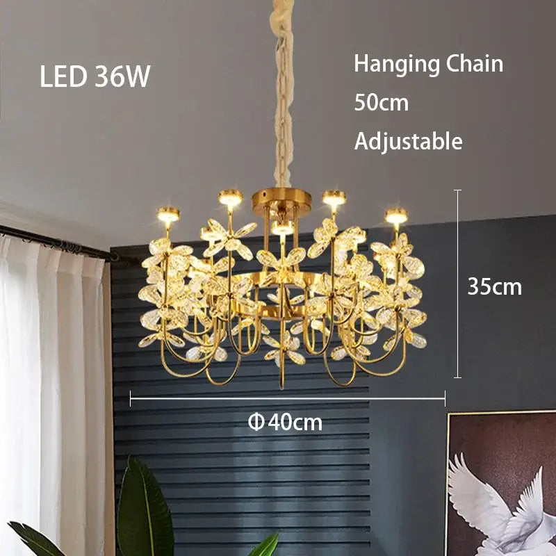 Gold-toned decorbites butterfly chandelier with crystal flower accents and adjustable hanging chain for dining room light