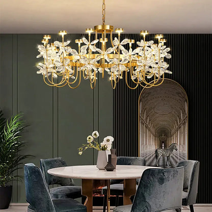 Gold-toned decorbites butterfly chandelier with intricate crystal flower designs for dining room lighting