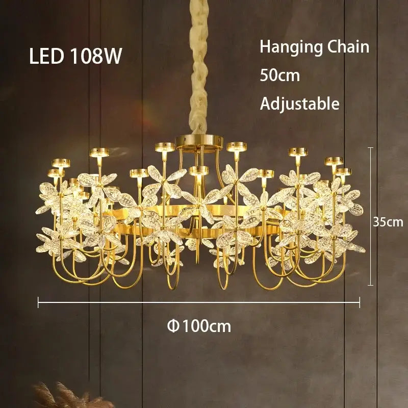 Gold-toned decorbites butterfly chandelier with crystal flower accents and adjustable hanging chain for dining room lighting