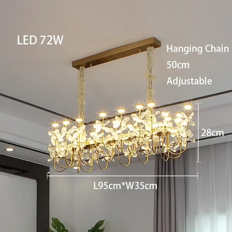 Gold-toned decorbites butterfly chandelier with crystal butterfly motifs and led lighting for dining room use