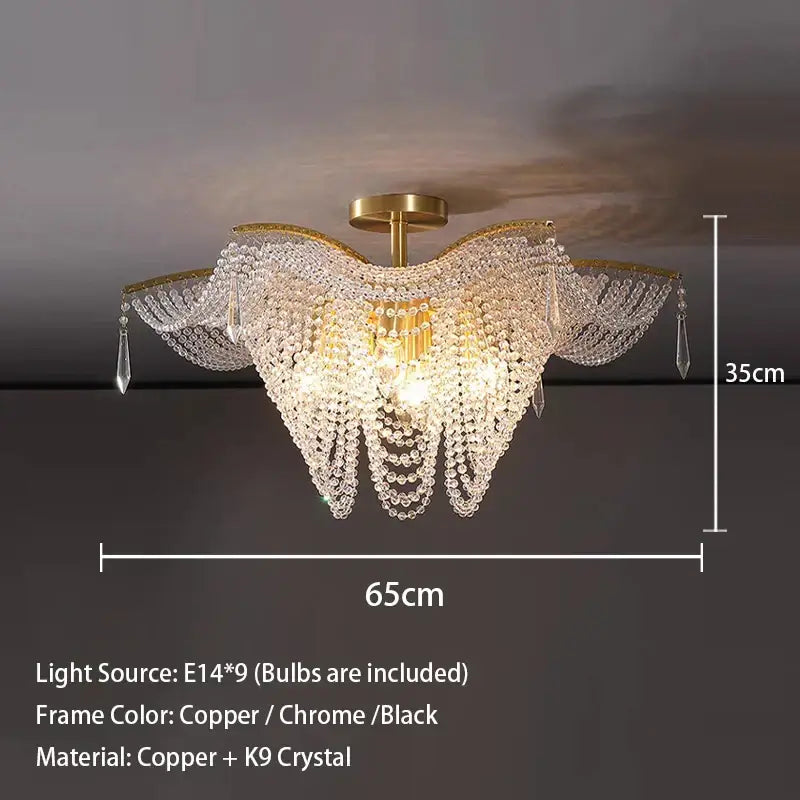 A decorbites butterfly crystal large gold chandelier with a golden copper frame and clear k9 crystal beads