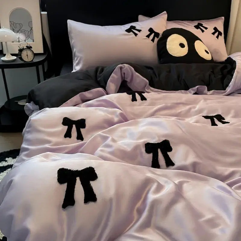 Lavender satin duvet cover set with black embroidered pi symbols and decorbites butterfly embroidered black and white pi pillow