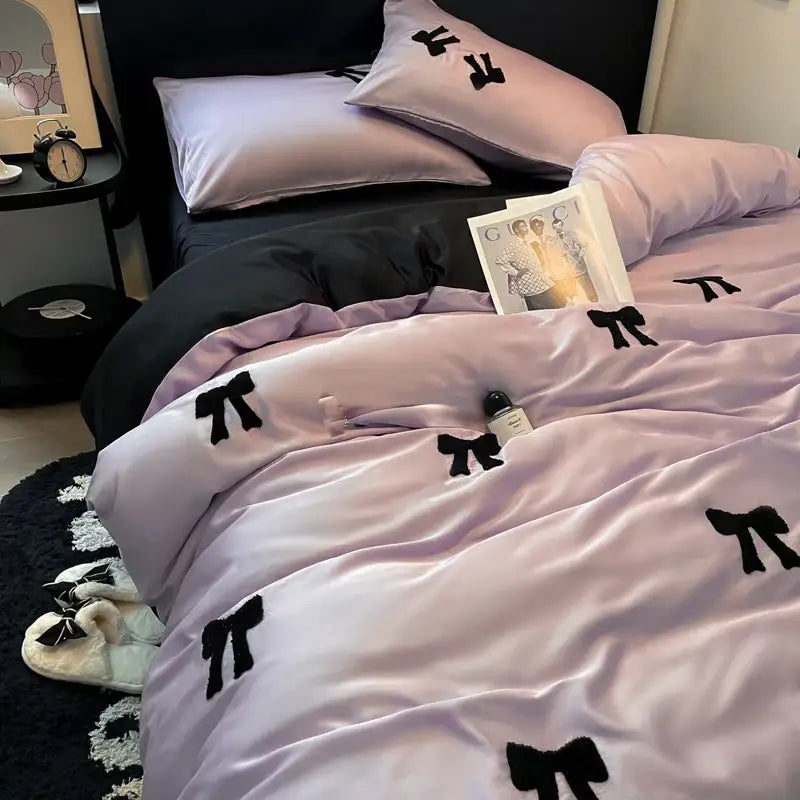 Lavender satin duvet cover set with black embroidered bow designs featuring decorbites butterfly embroidered details