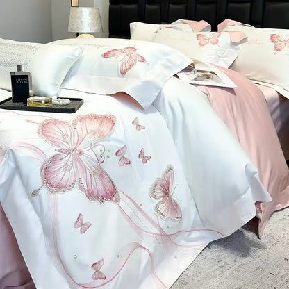White satin duvet cover with delicate pink decorbites butterfly embroidery and subtle beaded accents bedding set
