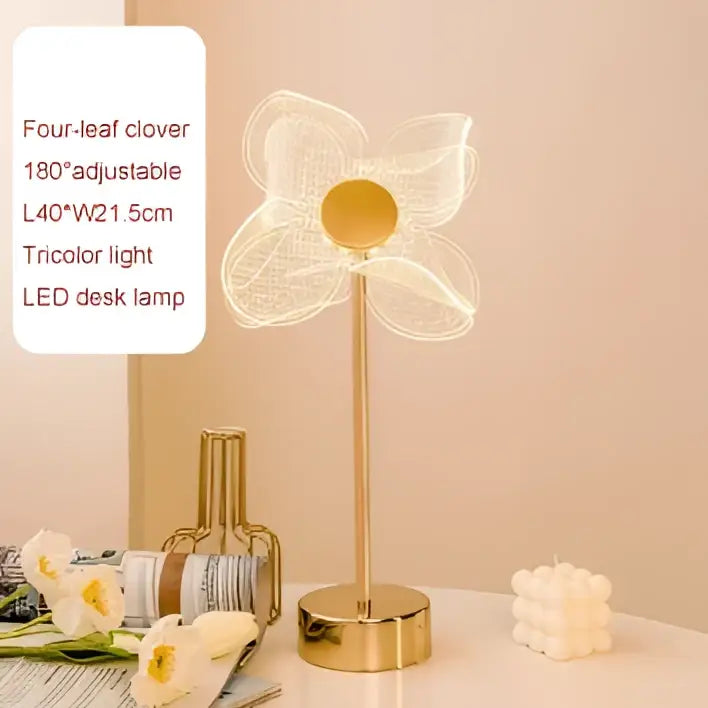 Decorbites butterfly gold acrylic led desk lamp in gold shaped like a four-leaf clover with adjustable tricolor light