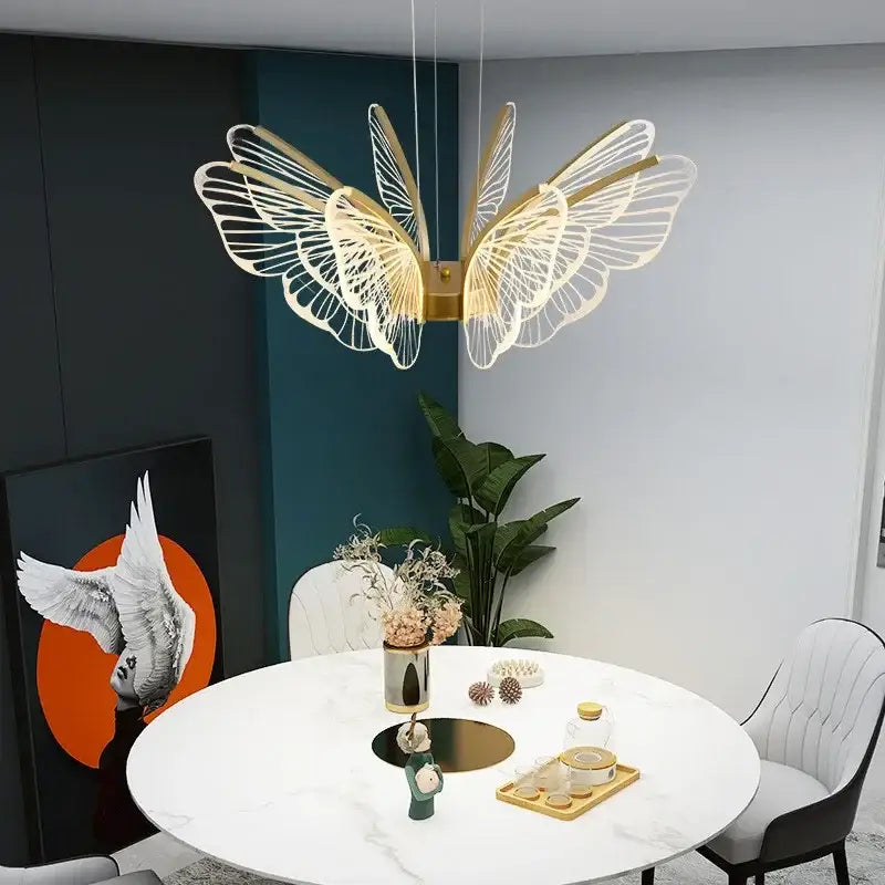Gold-toned decorbites butterfly led chandelier pendant light with intricate translucent wings for bedroom use