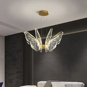 Gold-toned decorbites butterfly led chandelier pendant light with delicate wireframe wings for bedroom decor