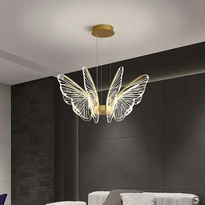 Gold-toned decorbites butterfly led chandelier pendant light with delicate wireframe wings for bedroom decor