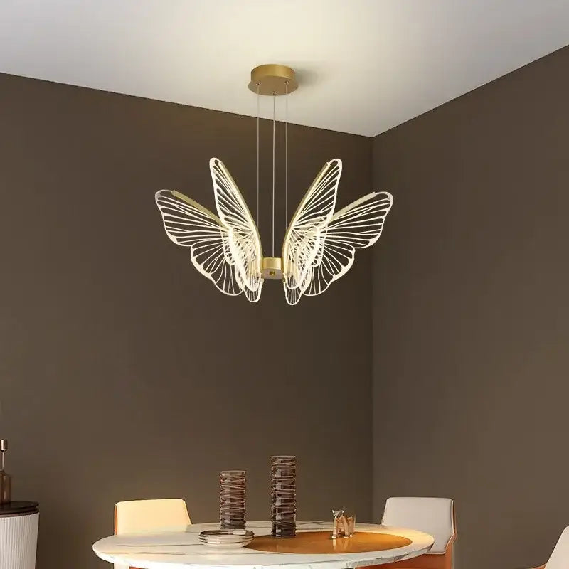 Gold-toned decorbites butterfly led chandelier pendant light with intricate wireframe wings for bedroom decor