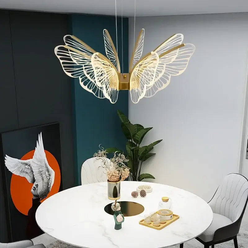 Gold-toned decorbites butterfly led chandelier pendant light with intricate wings and illuminated body for bedroom use