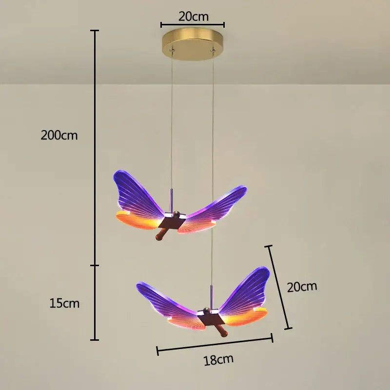 Decorbites butterfly pendant light glowing purple and orange led with gold-finished circular mount for dining room