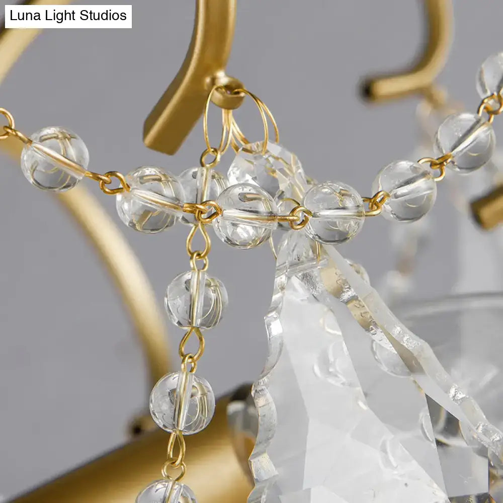 Decorbites butterfly shaped chandelier with clear crystal beads and brass frame is an elegant living room inch fixture