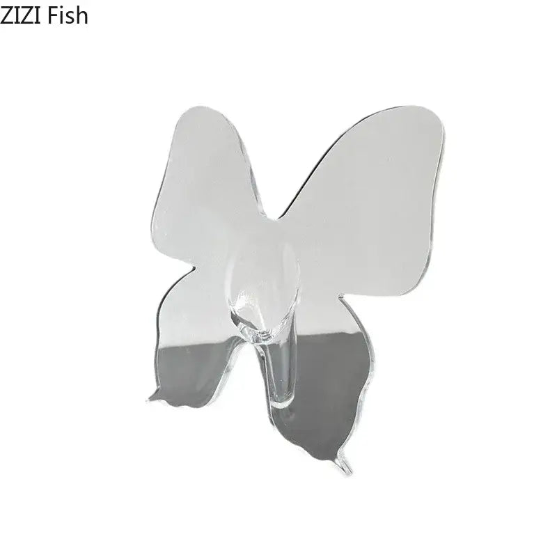 Clear transparent butterfly-shaped adhesive hook with minimalist design for DecorBites™ butterfly vase aesthetic room decor