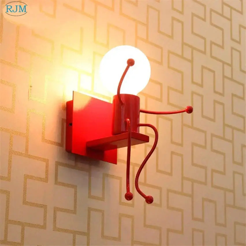 Red metallic decorbites cartoon children iron wall lamp with articulated limbs and a glowing spherical head for bedroom decor