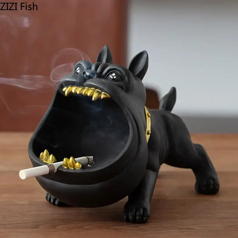 Black ceramic decorbites cartoon dog ashtray with gold tooth and collar accents holding a cigarette in its mouth