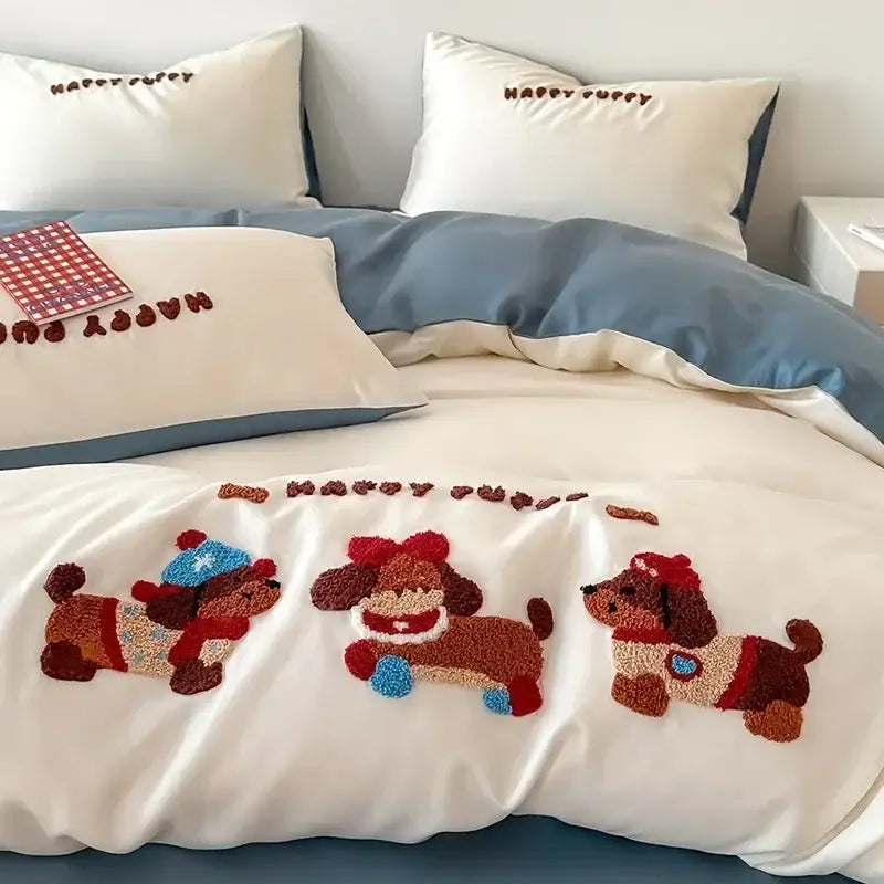 White duvet cover with three embroidered fluffy brown puppies in festive outfits from decorbites cartoon embroidered cotton bedding set