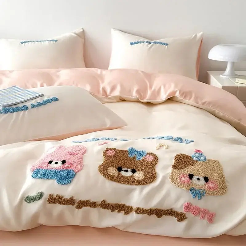 Cream-colored duvet cover with plush embroidered pink and brown bear faces from decorbites cartoon embroidered cotton bedding set