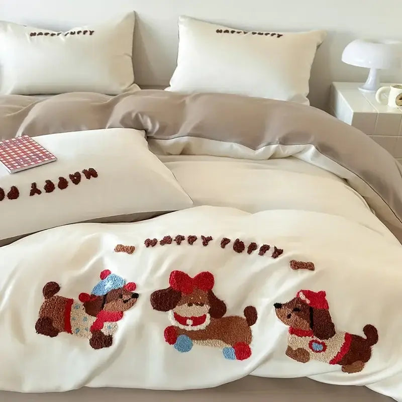 Cream-colored cotton bedding set featuring decorbites cartoon embroidered brown puppies with festive hats and scarves