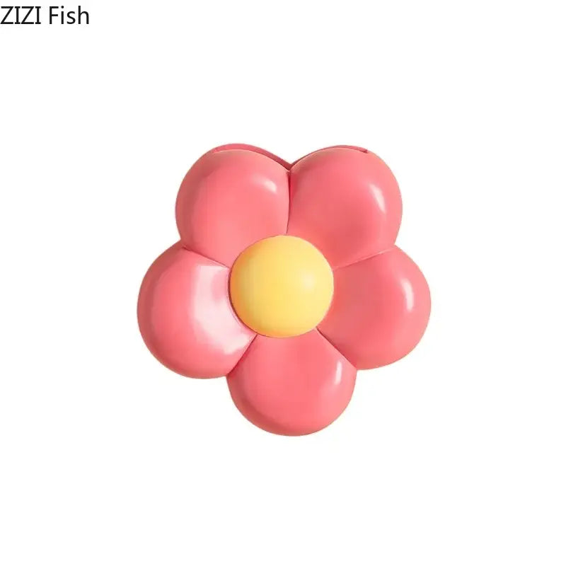 Pink and yellow plastic flower-shaped bathroom organizer from decorbites cartoon flower vase wall decor collection
