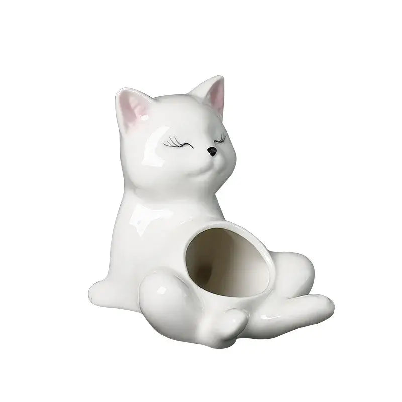 White ceramic kitten ceramic flowerpot with pink inner ears and closed eyes by decorbites cartoon kitten for succulents