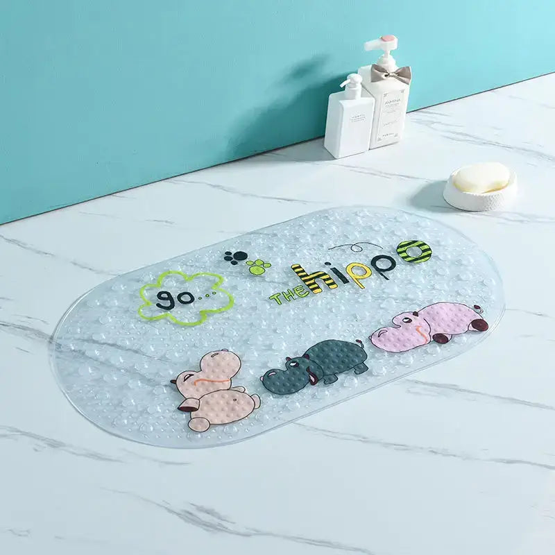 Clear textured bathroom mat with colorful cartoon hippos and hippo lettering from decorbites cartoon non-slip series