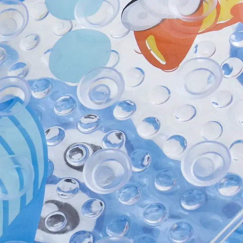 Blue textured decorbites cartoon non-slip bathroom mat with bubble-like domes and cartoon fish for children