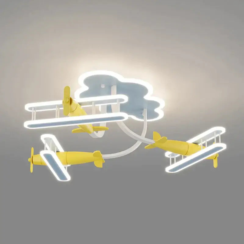 Yellow biplane-themed chandelier light with illuminated wings and cloud fixture for kids decorbites cartoon plane room lamp
