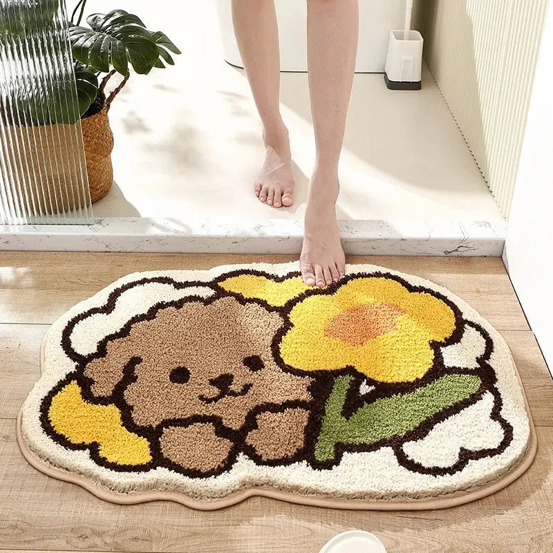 Cute beige and yellow decorbites cartoon puppy flocked bath rug featuring a smiling poodle with sunflower design