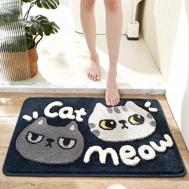 Navy blue plush bath mat with embroidered gray and white cat faces and fluffy white cat meow lettering, decorbites cartoon puppy flocked rug