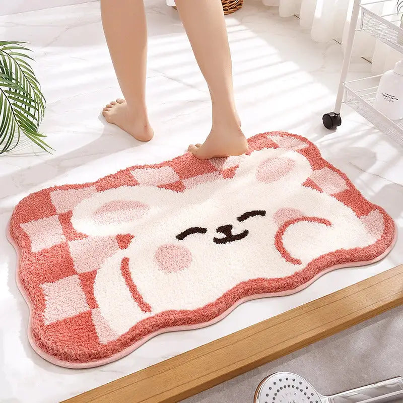 Pink and white plush bear-shaped bath mat with checkered pattern for bathroom use from decorbites cartoon puppy flocked collection
