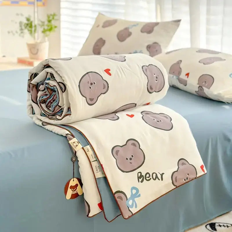 A soft white cotton decorbites cartoon summer blanket with gray bear patterns red hearts and brown trim for bedding