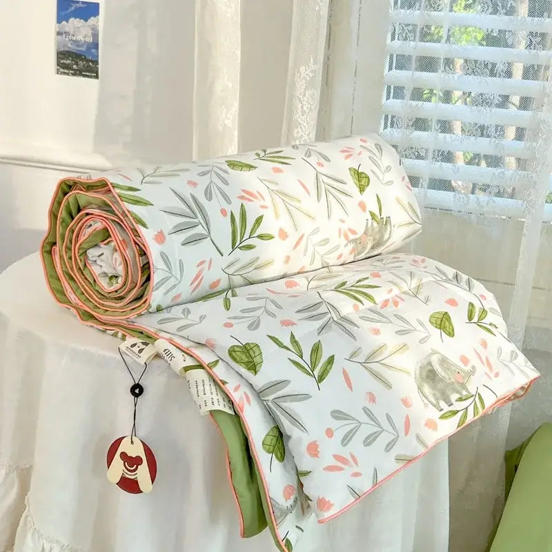 A decorbites cartoon summer cotton teddy bear blanket with a soft rolled quilt in green and pink botanical print