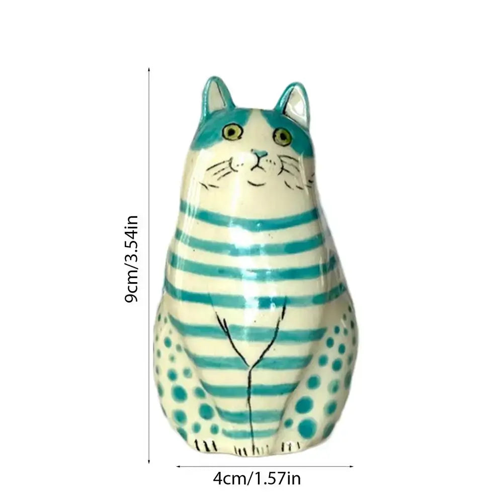 DecorBites™ cat polka dot resin flower bud vase featuring a turquoise and cream striped ceramic cat with blue polka dots