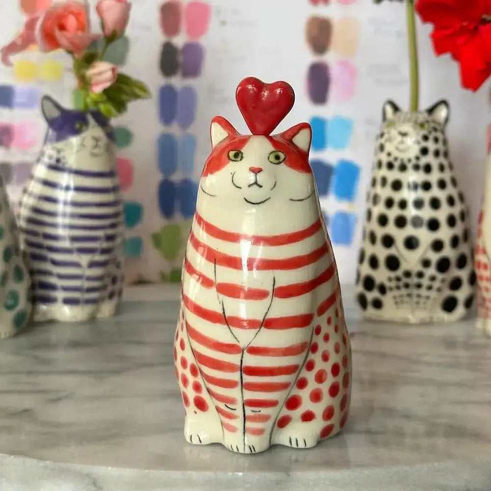 A red and white polka dot cat vase ceramic figurine with glossy red heart from DecorBites™ resin flower bud vase collection