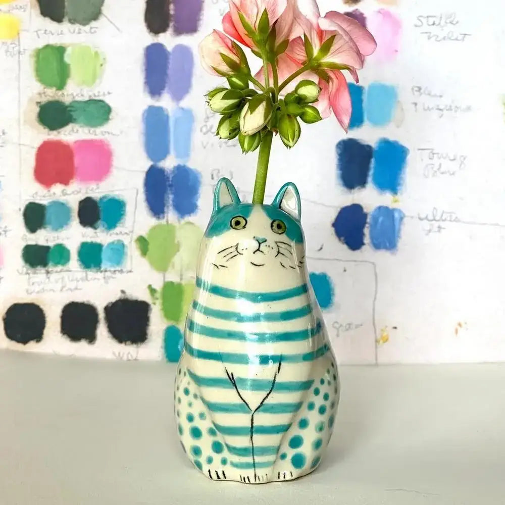 DecorBites cat vase ceramic with turquoise stripes polka dot lower body painted face holding pink flowers