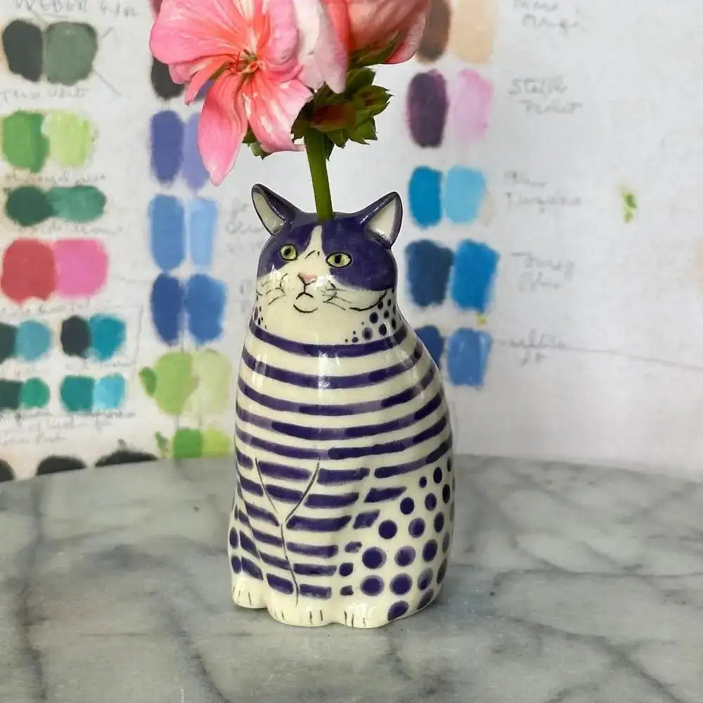 DecorBites™ cat vase ceramic with purple and white polka dot stripes holding a pink flower bud in resin form