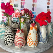 A collection of colorful ceramic cat vases with polka dot patterns from decorbites™ for flower display
