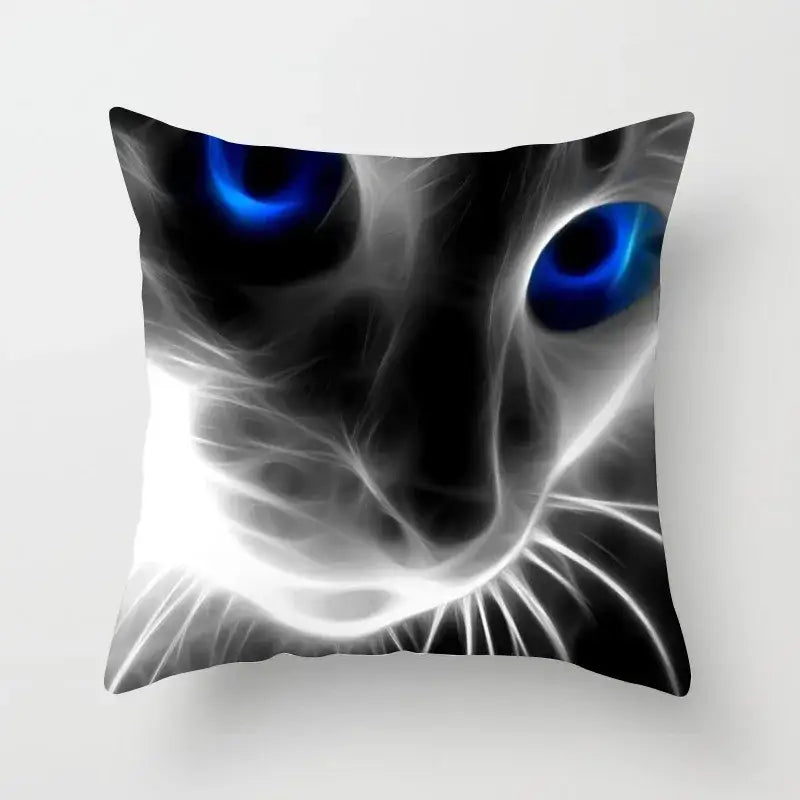 A decorbites cat printed black and white plush cushion cover with a striking abstract cat face and vivid blue eyes
