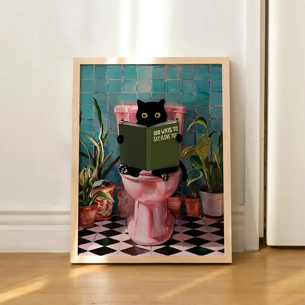 Framed decorbites™ wall art of a black cat reading on a pink toilet canvas with teal tiles and potted plants background