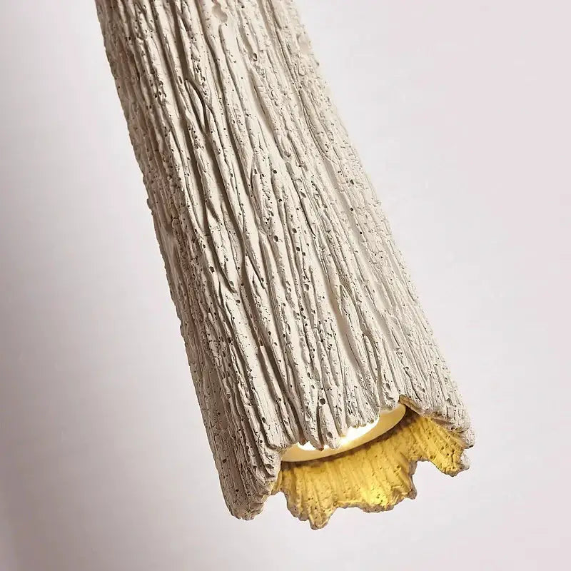 Textured off-white decorbites cement cream led pendant light with golden fluted glass diffuser for bedroom bedside