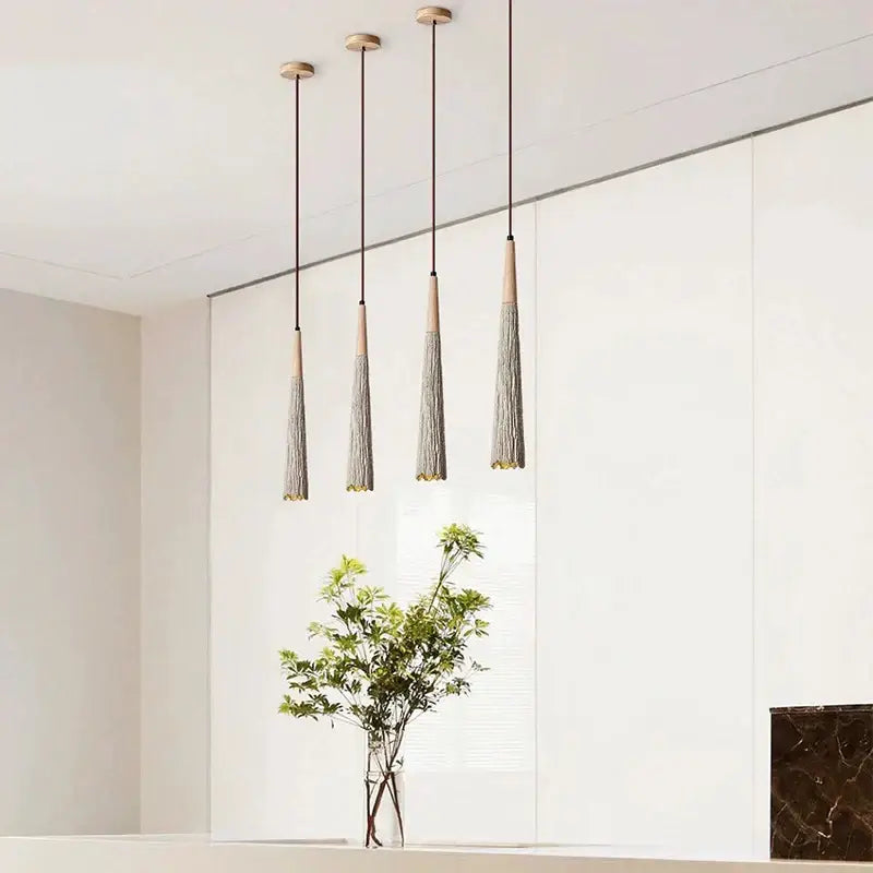 Four modern decorbites cement cream led pendant lights with wooden tops and gray tassel shades for bedroom bedside