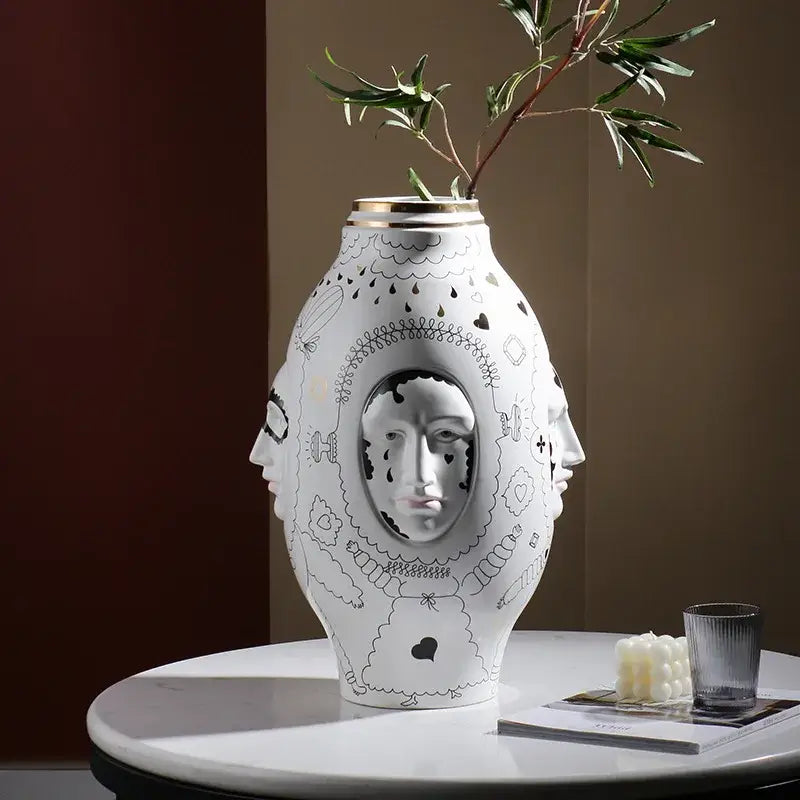 Decorbites™ ceramic vase desktop in white with black line art faces and gold rim for floral arrangements