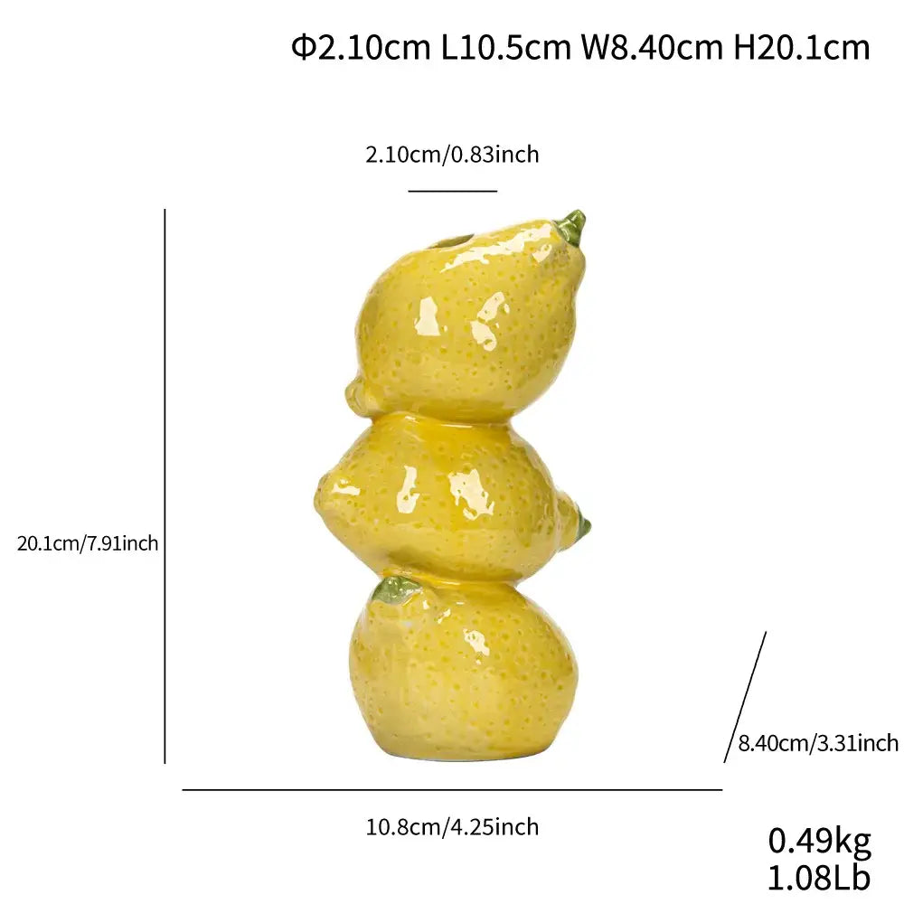 Glossy yellow ceramic fruit vase shaped like three stacked lemons by decorbites for home and office display