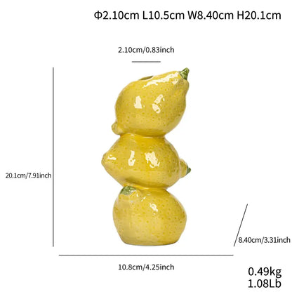 Glossy yellow ceramic fruit vase shaped like three stacked lemons by decorbites for home and office display