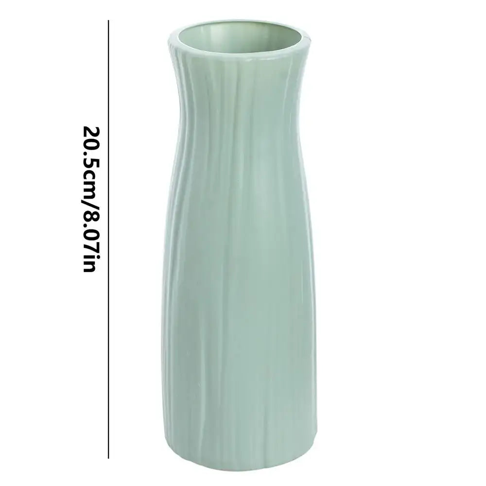 Decorbites ceramic-look plastic flower pot in soft mint green with vertical ribbed texture as vase imitation ceramic