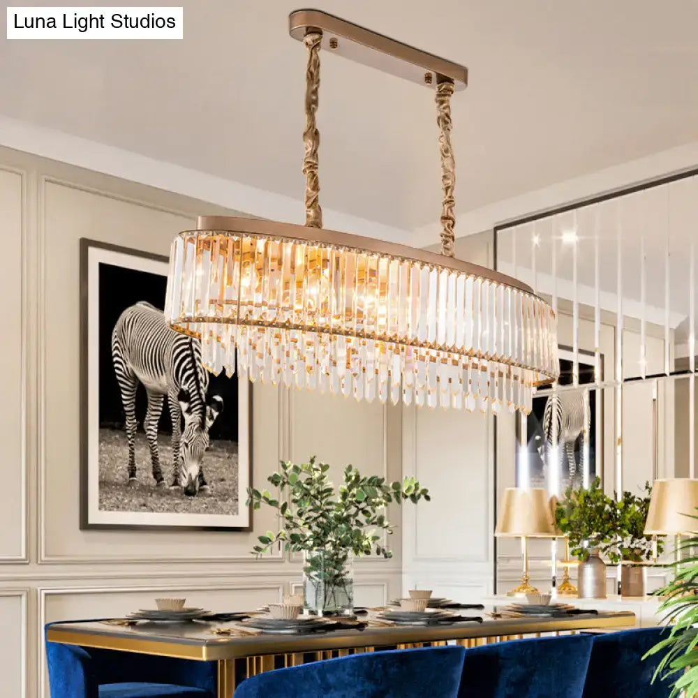 Decorbites™ champagne crystal prism island pendant with gold-toned oval frame and cascading clear crystal prisms