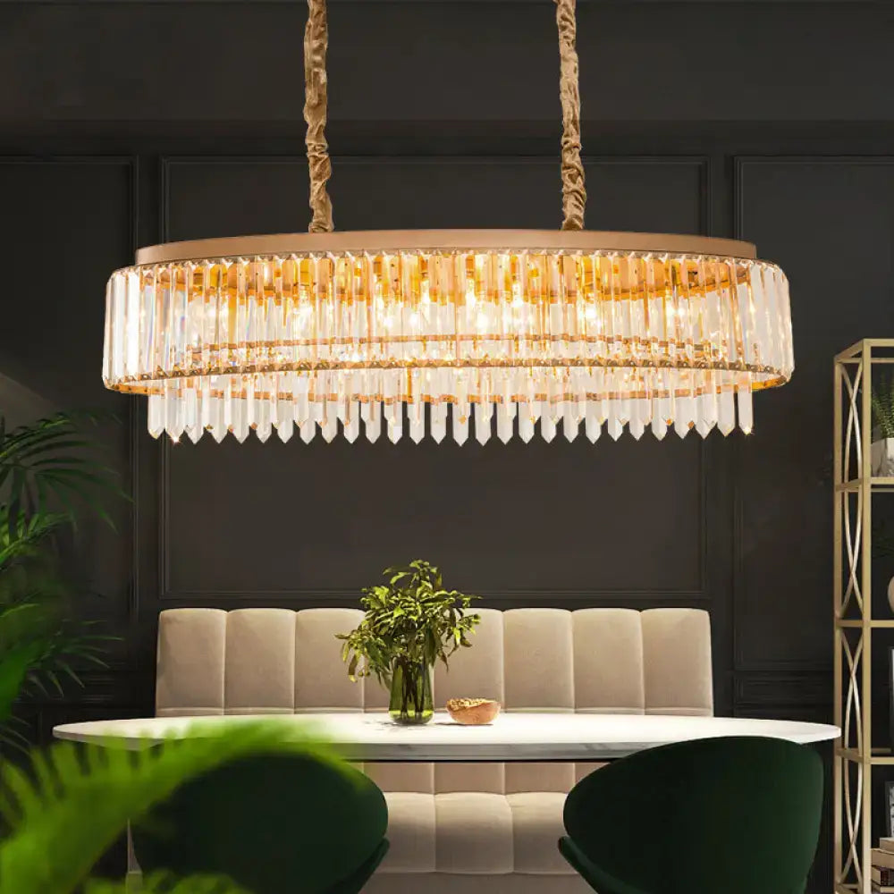Gold-toned decorbites champagne crystal prism island pendant with cascading clear crystal prisms and textured rope chains