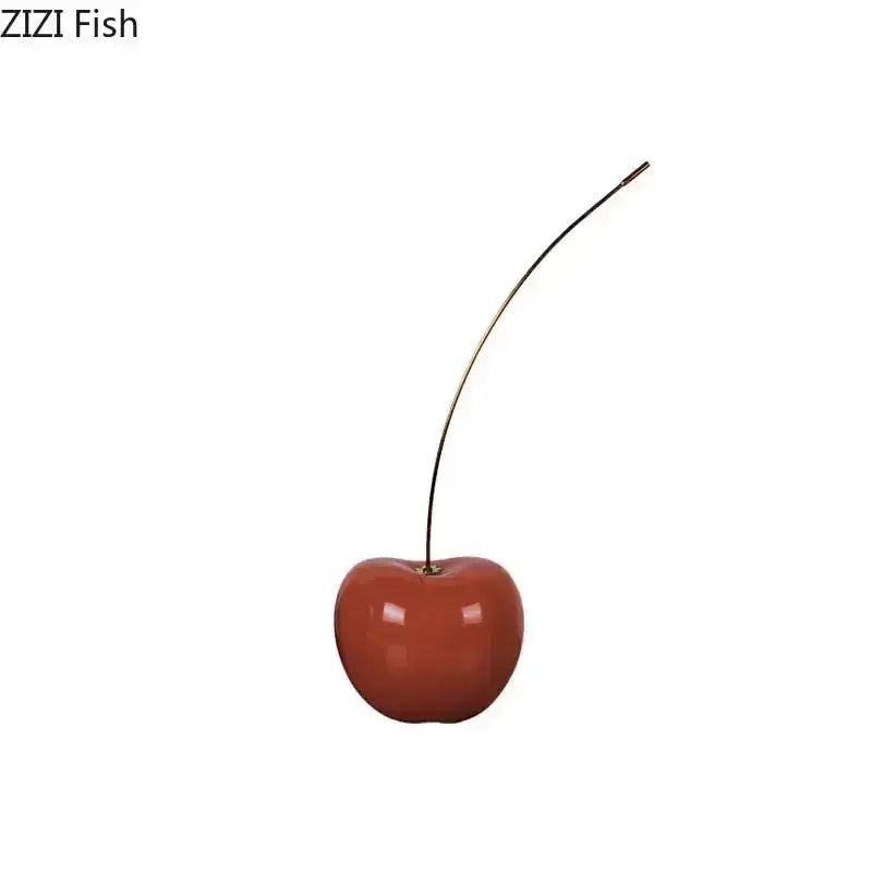 A glossy red cherry fruit sculpture resin desk ornament with a slender metallic stem by zizi fish for modern decor
