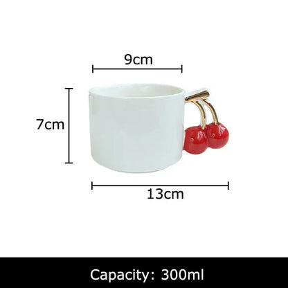 White ceramic tea cup with a gold-toned cherry handle mug by decorbites 300ml capacity for dining table use